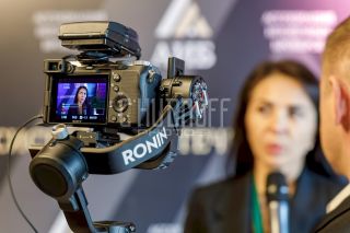 Репортажная фотосъемка конференции.