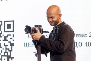 Репортажная фотосъемка конференции.
